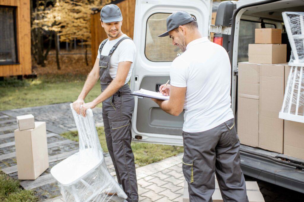 Men packing moving van
